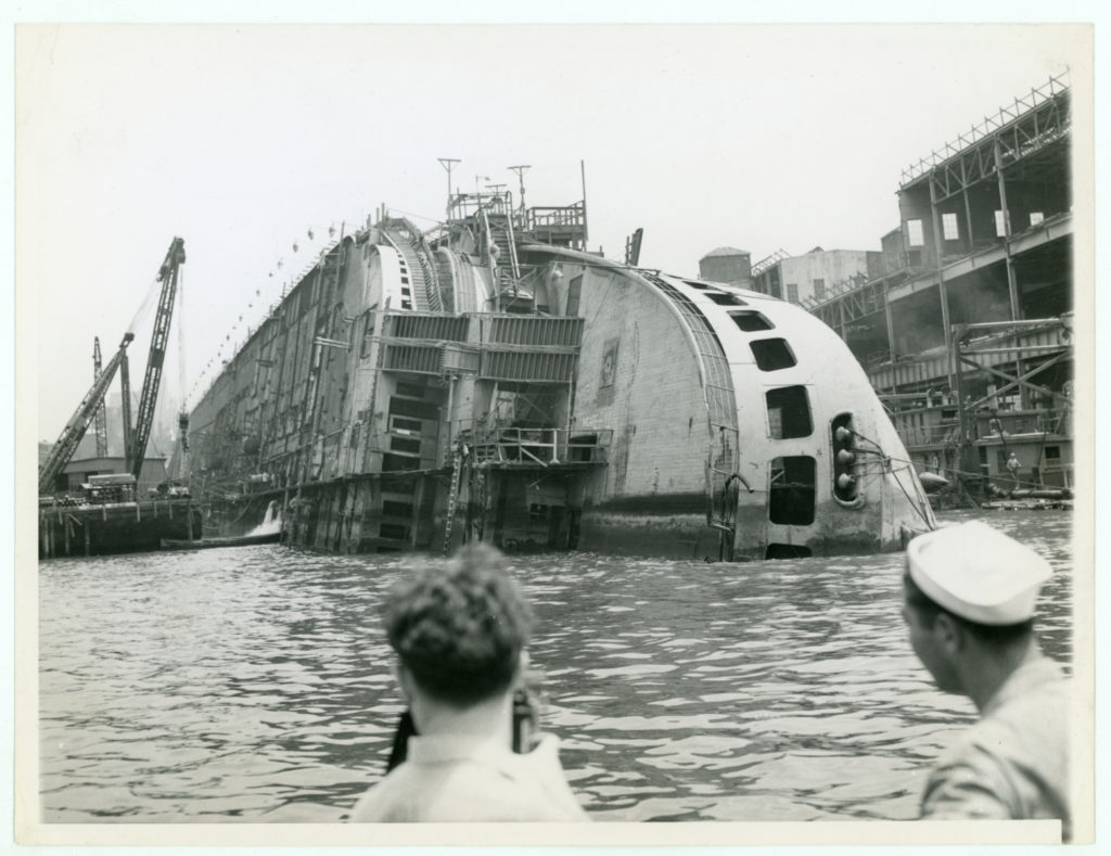 Capsized former Normandie undergoes salvage, July 15, 1943