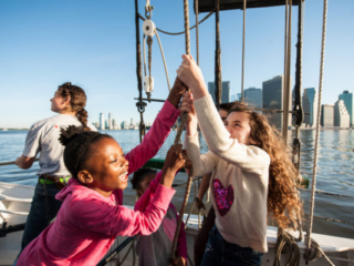 Children help raise Pioneer's sails Children help raise Pioneer's sails