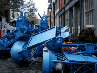 Museum signage strewn onto Water Street during Hurricane Sandy