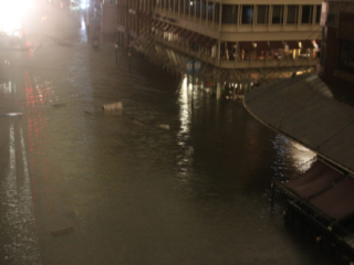 Nighttime photograph of the devastation of Hurricane Sandy on Fulton and Front Streets