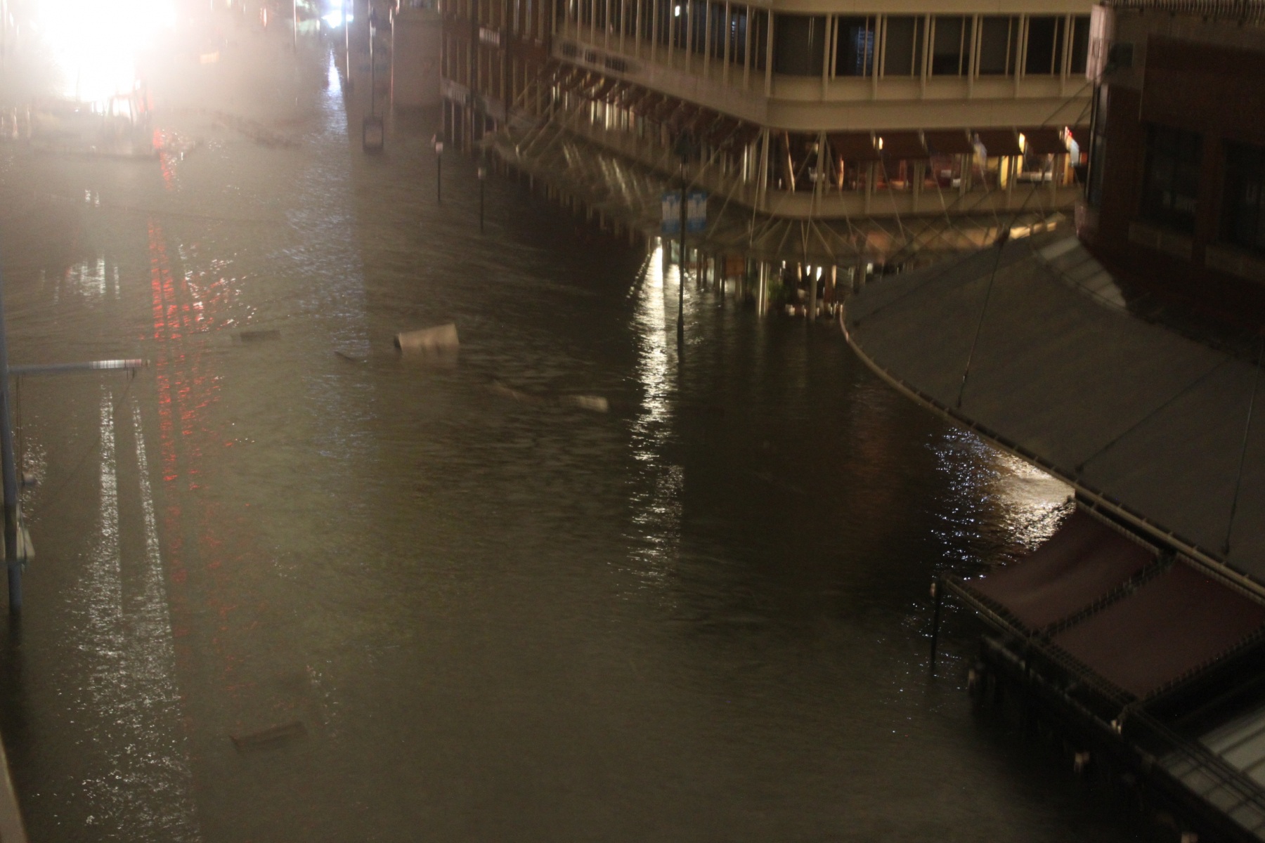 Nighttime photograph of the devastation of Hurricane Sandy on Fulton and Front Streets