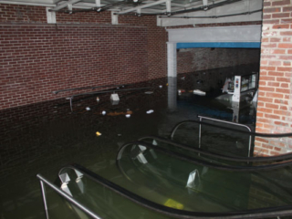 The devastation of Hurricane Sandy inside the Museum's main lobby at 12 Fulton Street